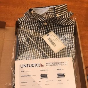 Untuck it Long sleeve. Never worn